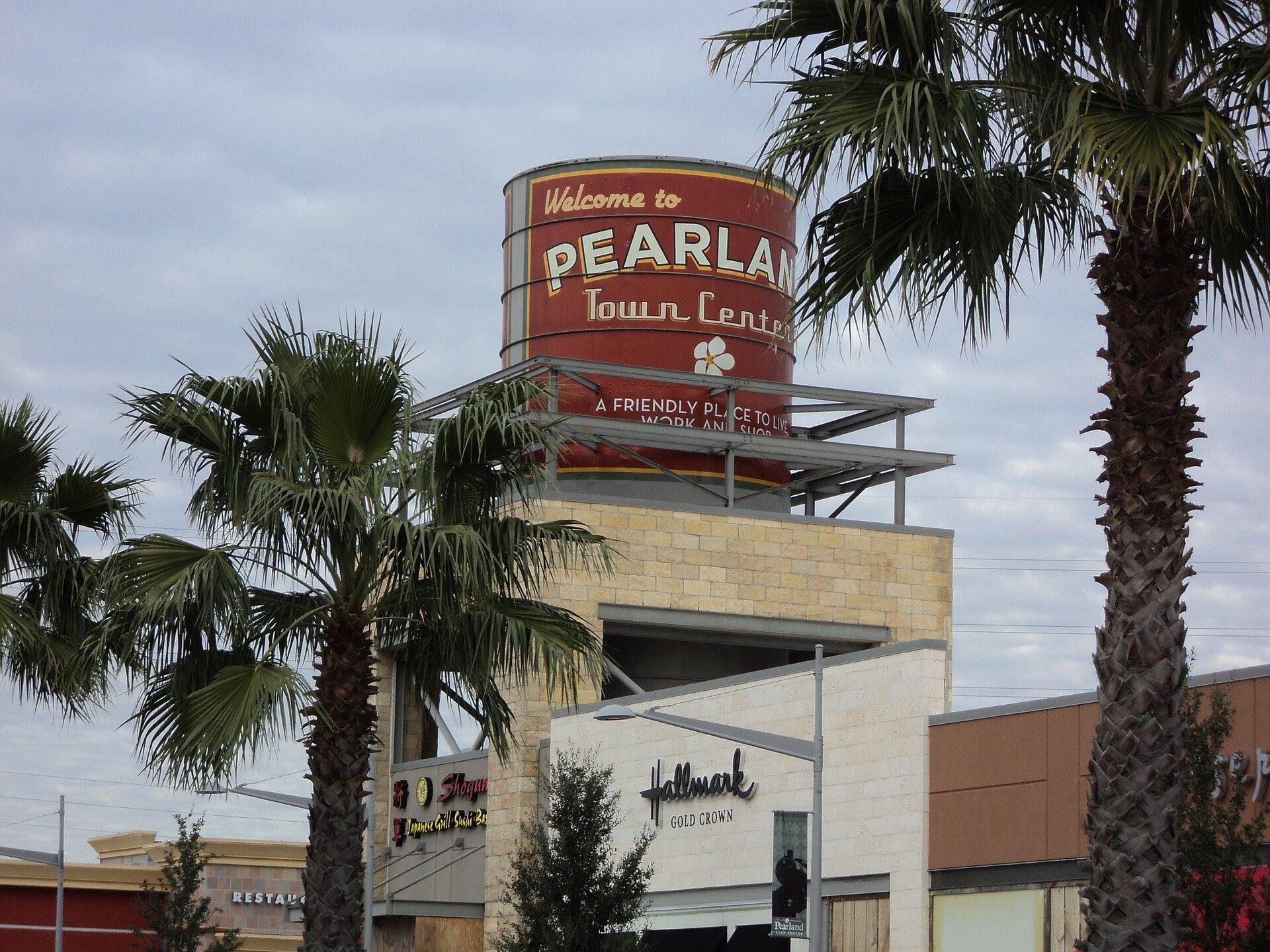 Pearland Town Center entrance with palm trees