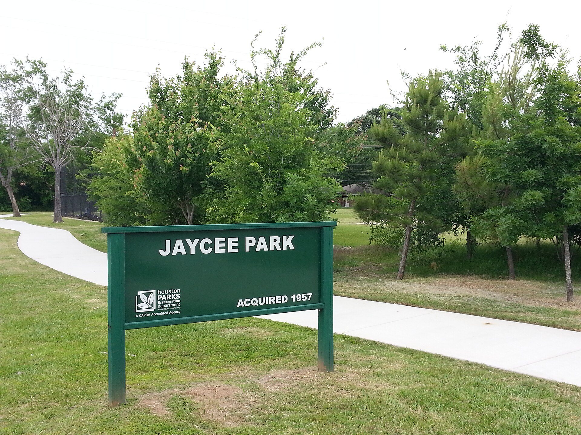 Walking path and trees at nearby Jaycee Park in northwest Houston