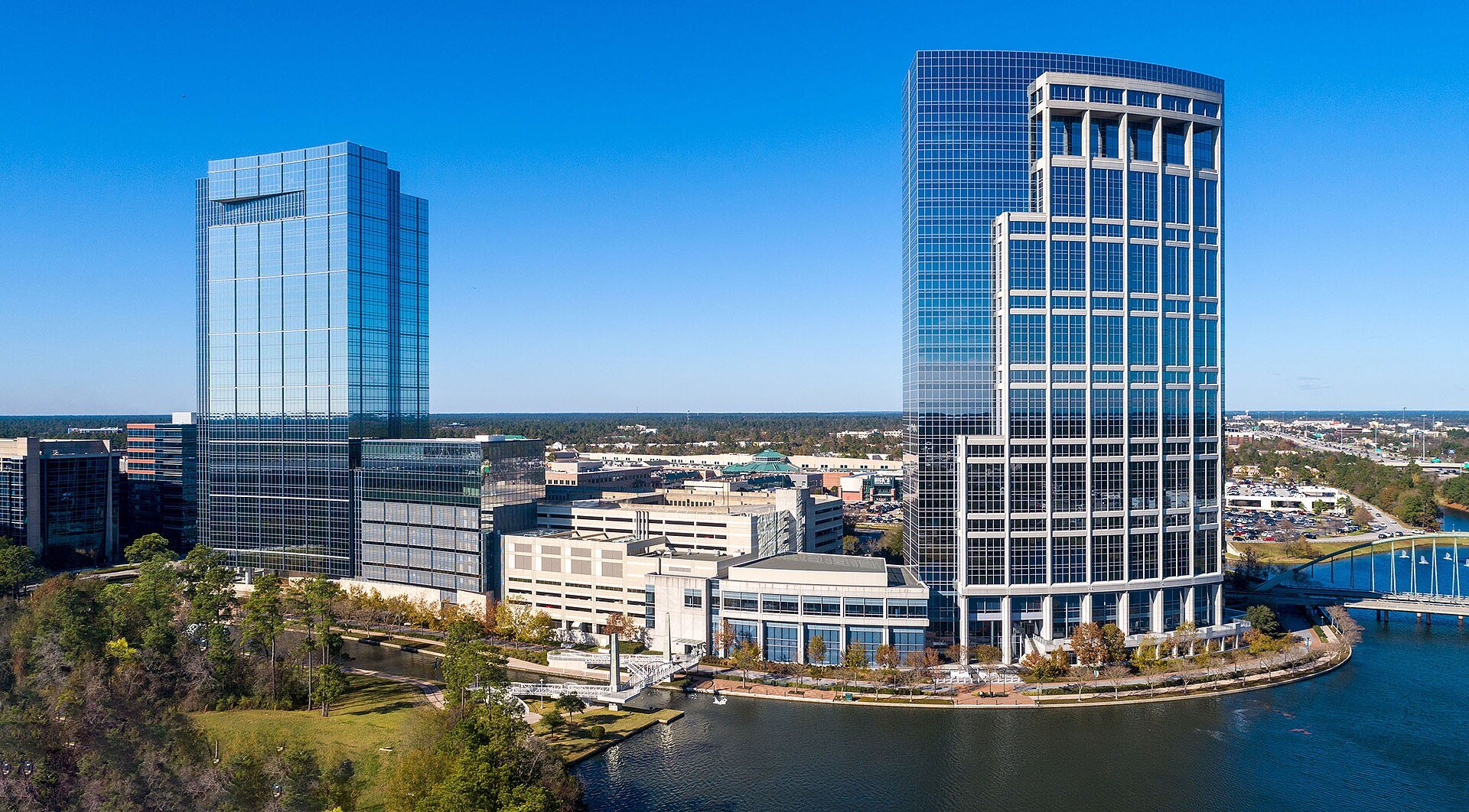 Office towers and waterfront in The Woodlands